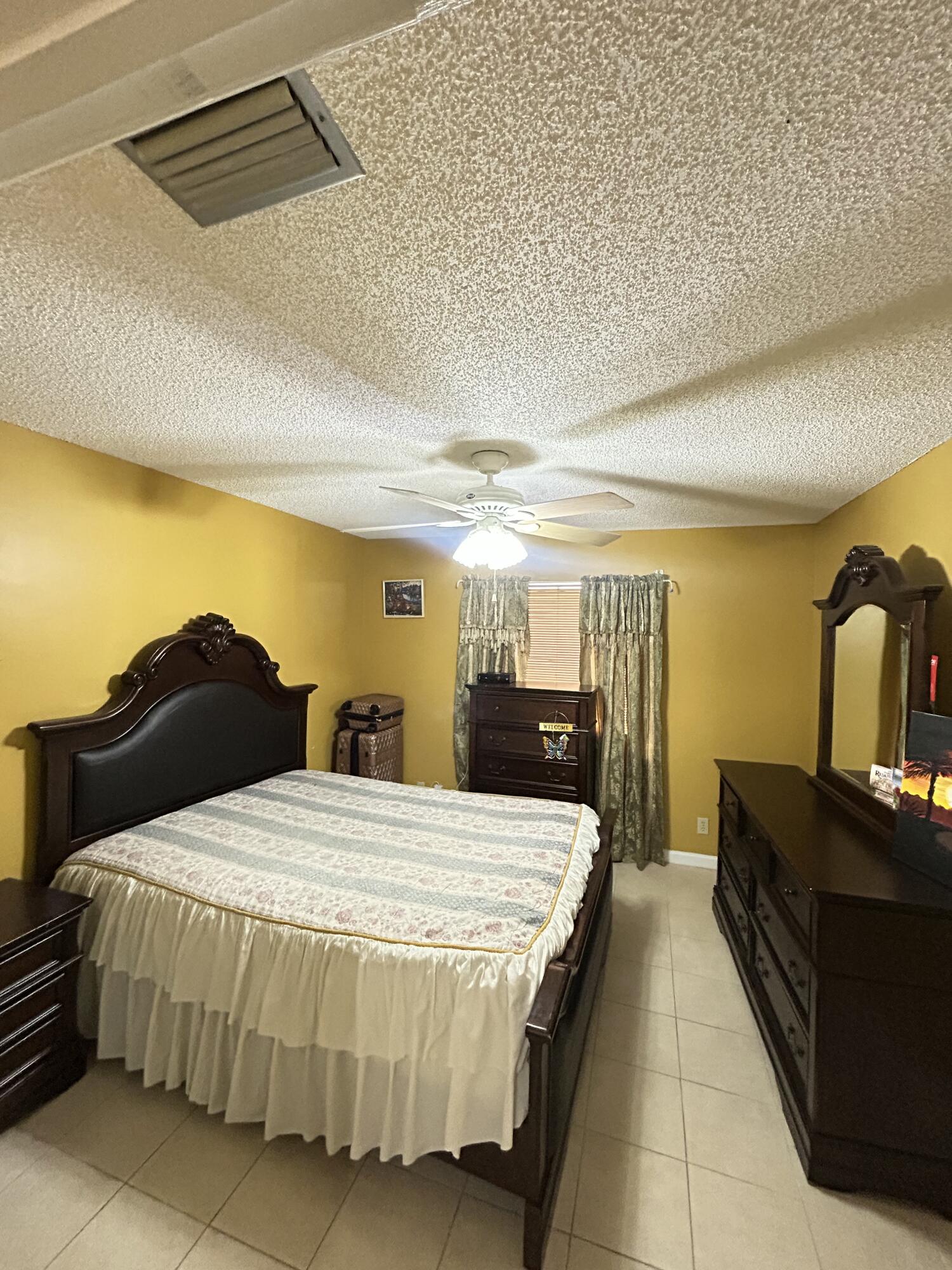 391 Springdale Circle Palm Springs, FL 33461 - Photo 12 of 22 921287A7-96D6-4ACB-88D1-6F00CD451A64