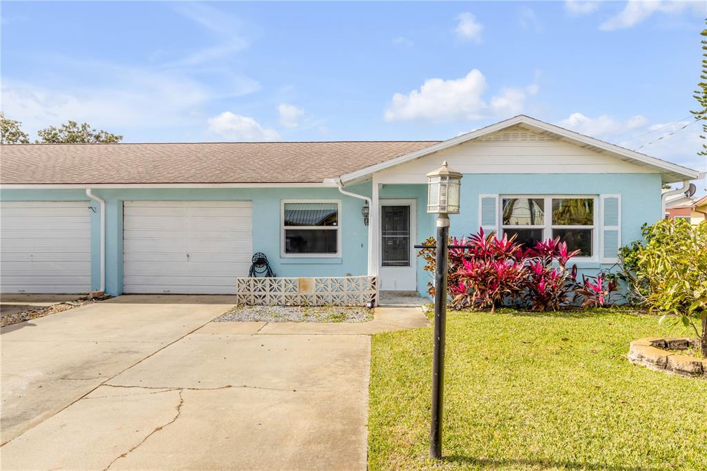 26 Laughing Gull Lane Edgewater, FL 32141 - Photo 2 of 66 a view of a house with backyard