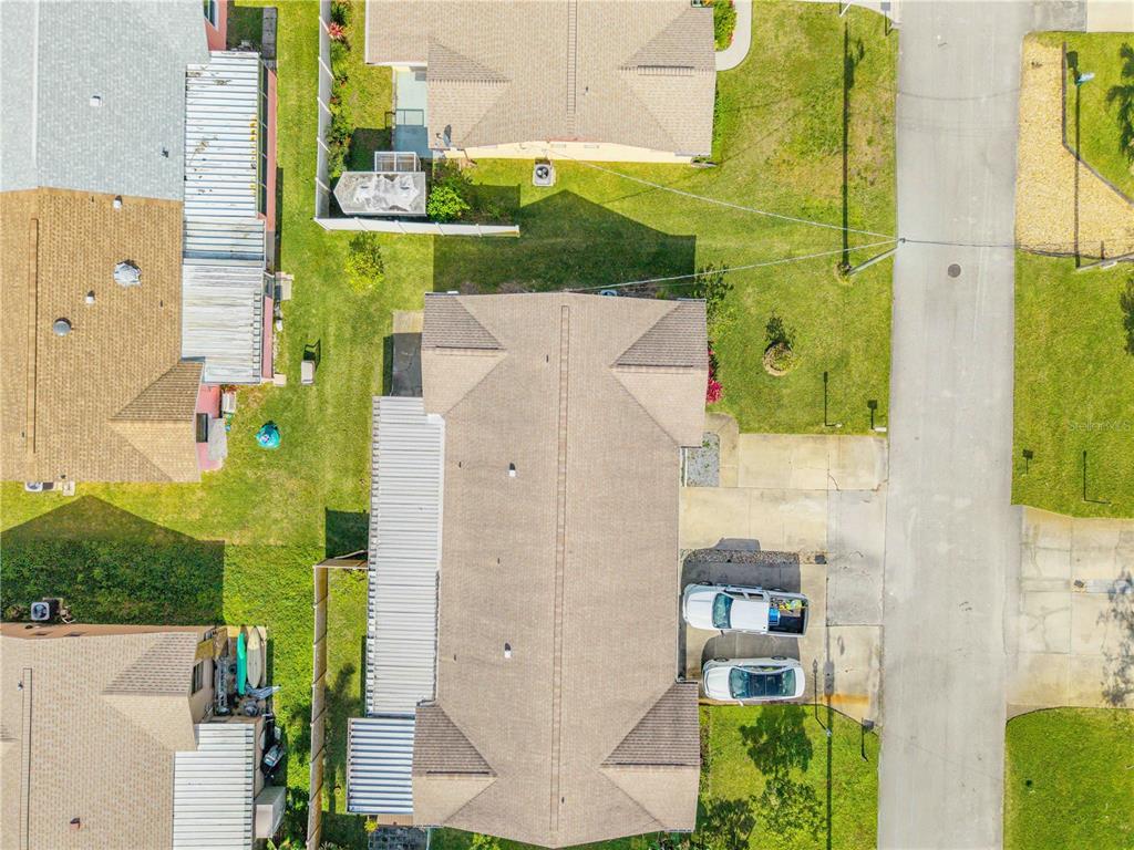 26 Laughing Gull Lane Edgewater, FL 32141 - Photo 39 of 66 aerial view of a house with a yard