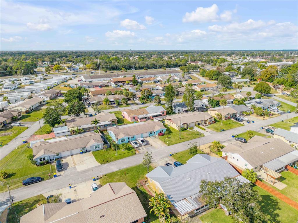 26 Laughing Gull Lane Edgewater, FL 32141 - Photo 40 of 66 an aerial view of residential houses with outdoor space
