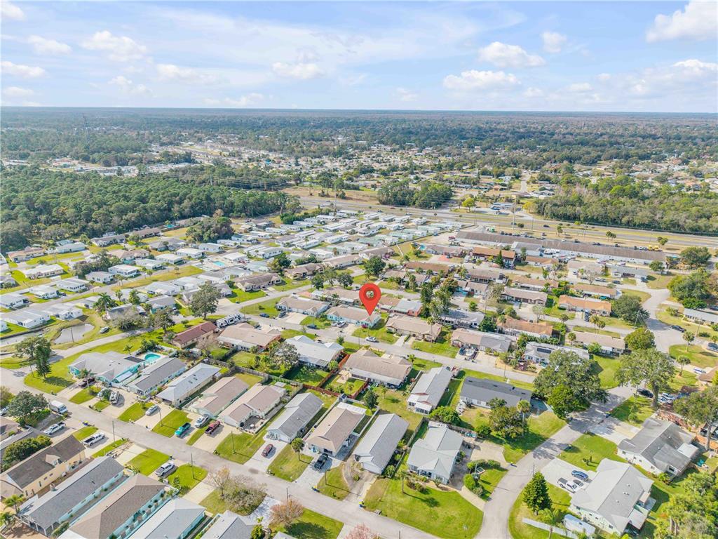 26 Laughing Gull Lane Edgewater, FL 32141 - Photo 43 of 66 an aerial view of multiple house