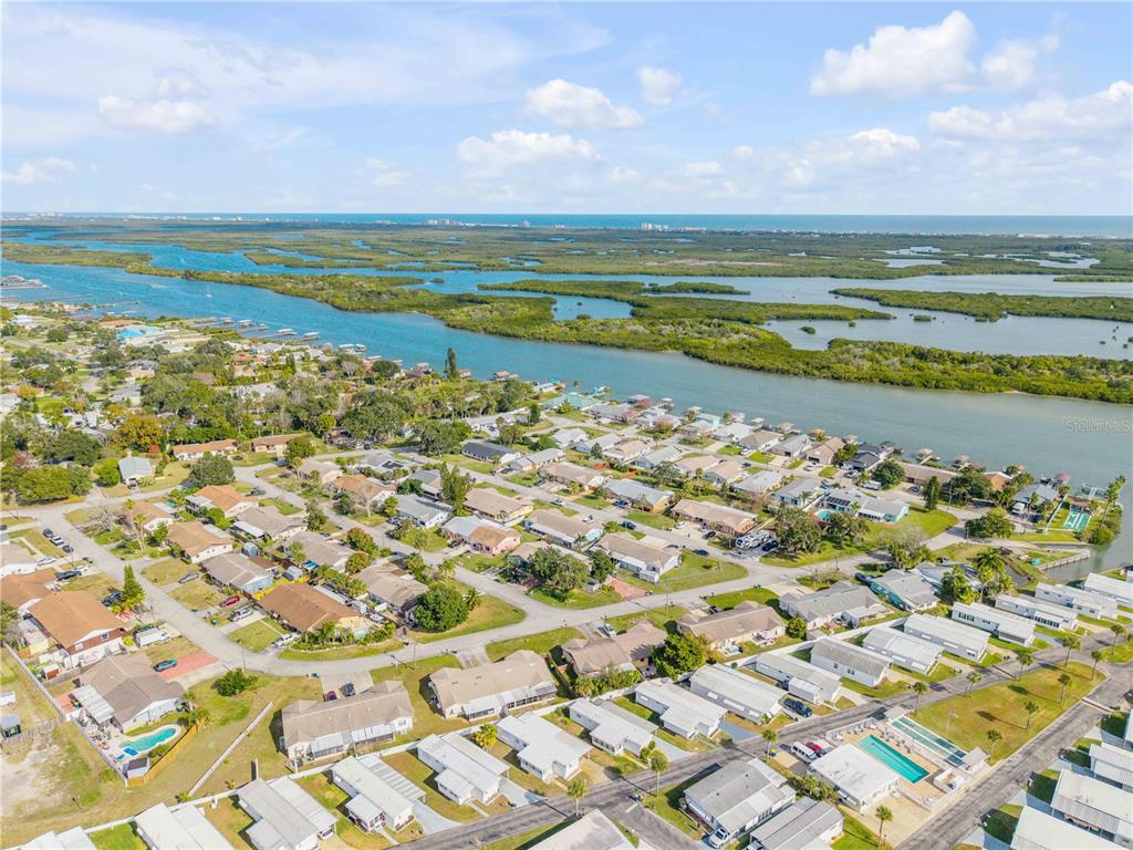 26 Laughing Gull Lane Edgewater, FL 32141 - Photo 46 of 66 a view of an ocean and beach