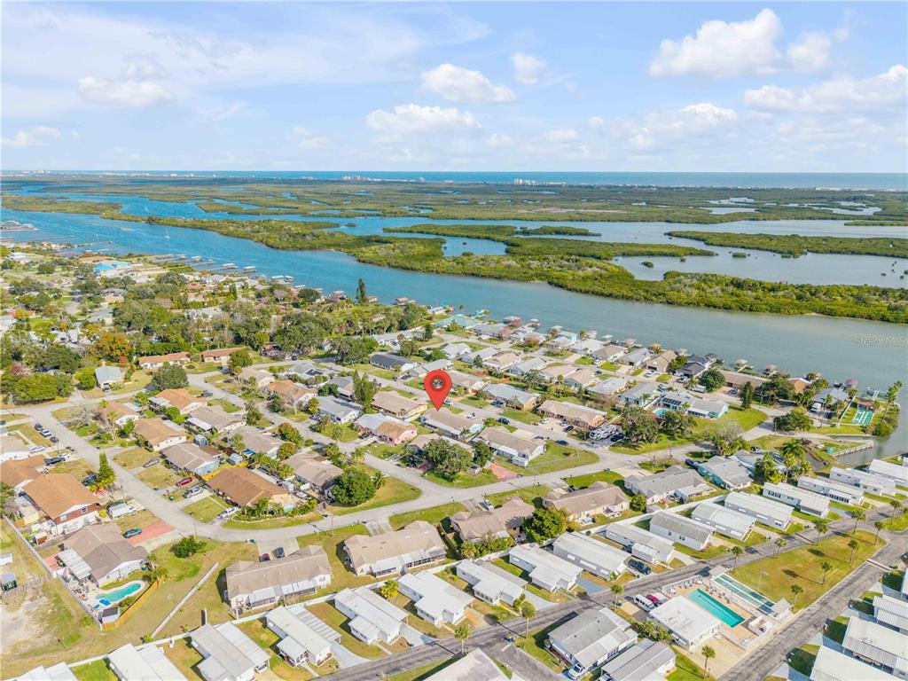 26 Laughing Gull Lane Edgewater, FL 32141 - Photo 47 of 66 a view of an ocean and beach