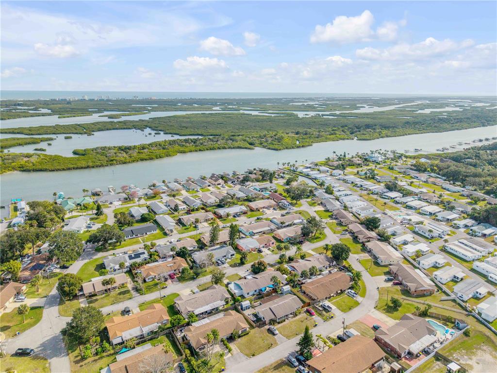 26 Laughing Gull Lane Edgewater, FL 32141 - Photo 48 of 66 an aerial view of residential houses with outdoor space