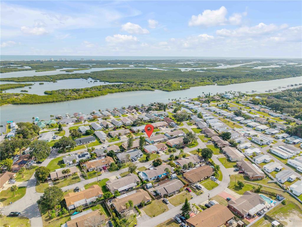26 Laughing Gull Lane Edgewater, FL 32141 - Photo 49 of 66 an aerial view of residential houses with outdoor space