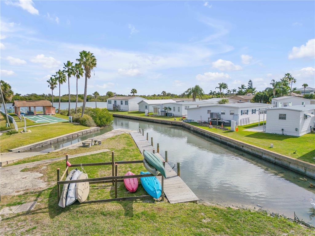 26 Laughing Gull Lane Edgewater, FL 32141 - Photo 52 of 66 an aerial view of a house with a swimming pool