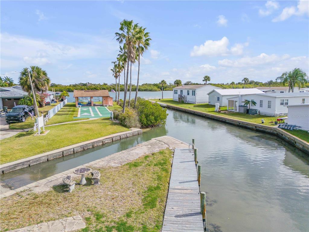 26 Laughing Gull Lane Edgewater, FL 32141 - Photo 53 of 66 a view of a lake with a ocean view