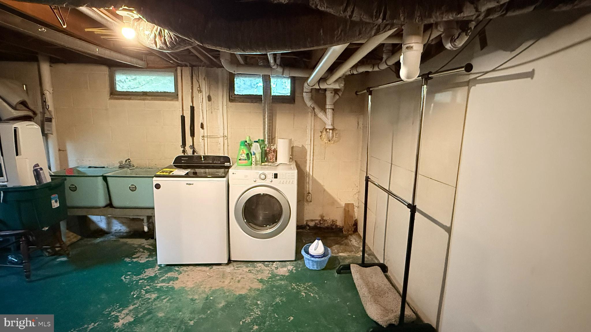 242 Spring Street State College, PA 16801 - Photo 70 of 73 Functional basement laundry area with natural l...