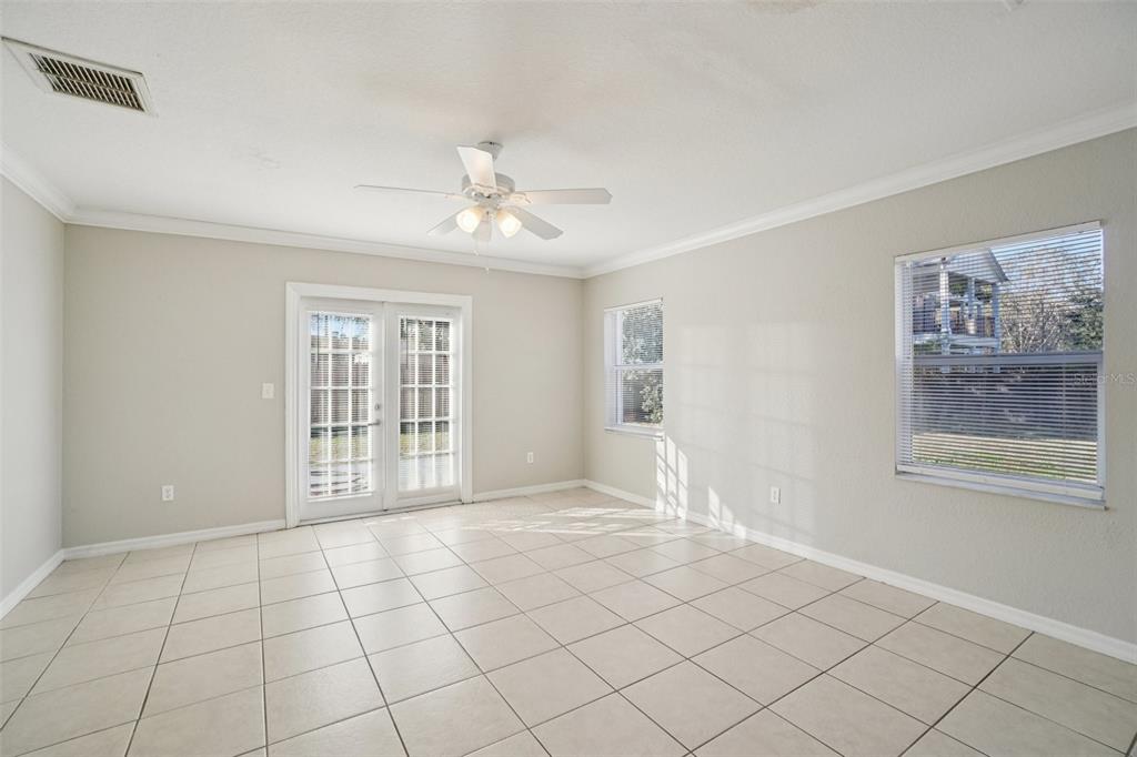 13210 Maple Street Odessa, FL 33556 - Photo 12 of 34 a view of an empty room with a window