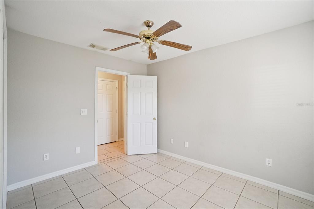 13210 Maple Street Odessa, FL 33556 - Photo 21 of 34 a view of an empty room