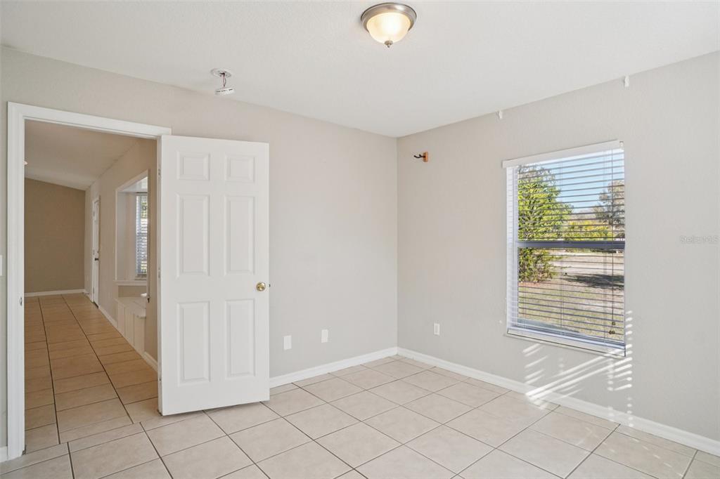 13210 Maple Street Odessa, FL 33556 - Photo 28 of 34 a view of an empty room with window