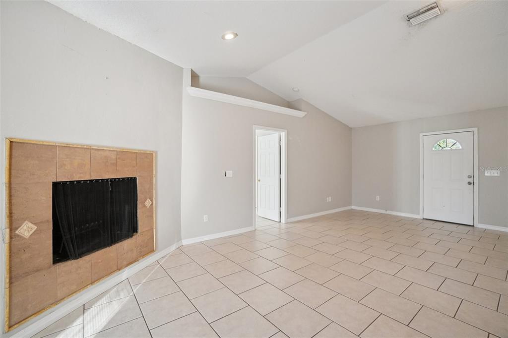13210 Maple Street Odessa, FL 33556 - Photo 7 of 34 a view of an empty room and window