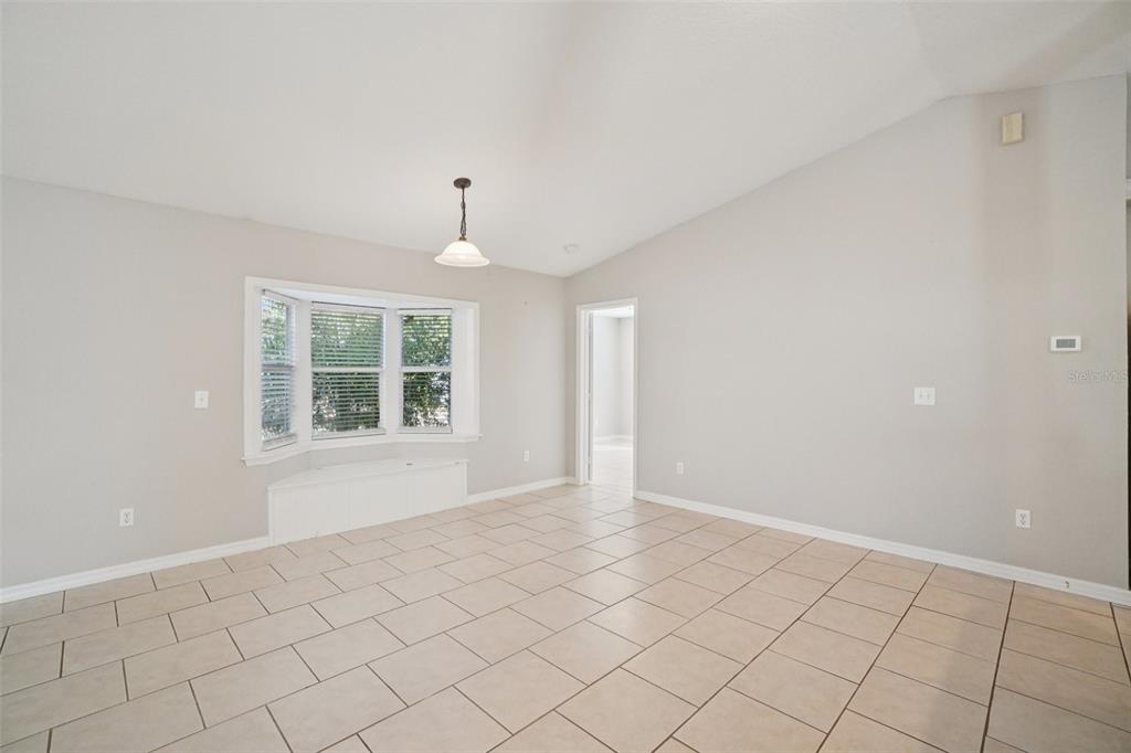13210 Maple Street Odessa, FL 33556 - Photo 9 of 34 a view of an empty room with window