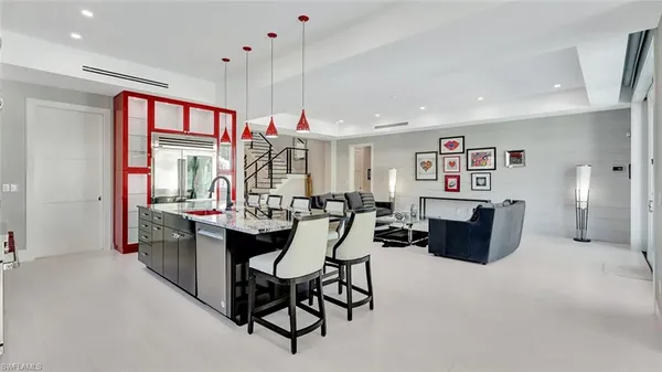 a view of a livingroom with furniture and window