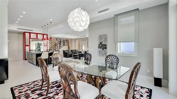 a view of a dining room with furniture