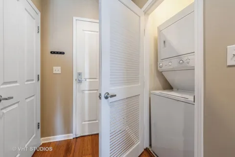 a view of bathroom with a sink and mirror