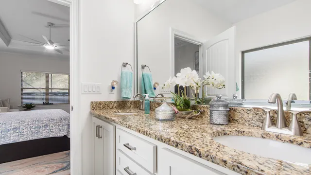 a bathroom with sink and mirror