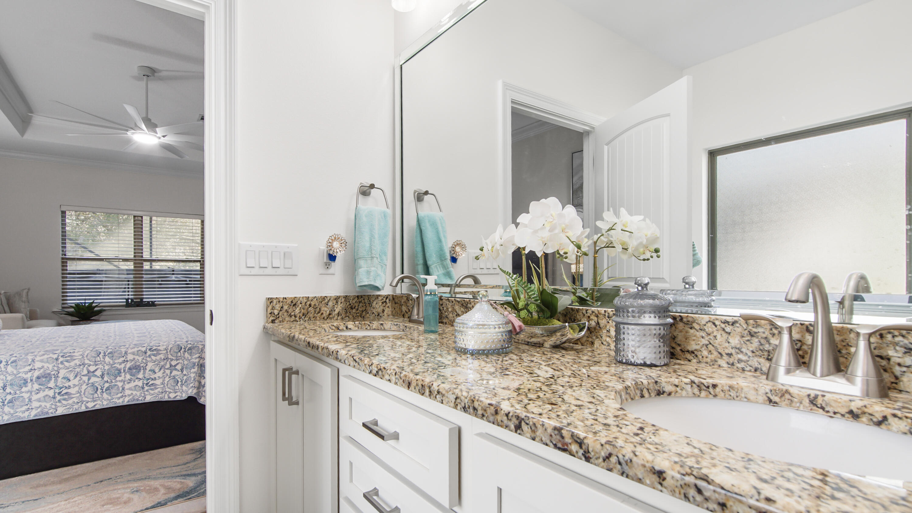 123 Big Oak Lane Santa Rosa Beach, FL 32459 - Photo 22 of 50 a bathroom with sink and mirror