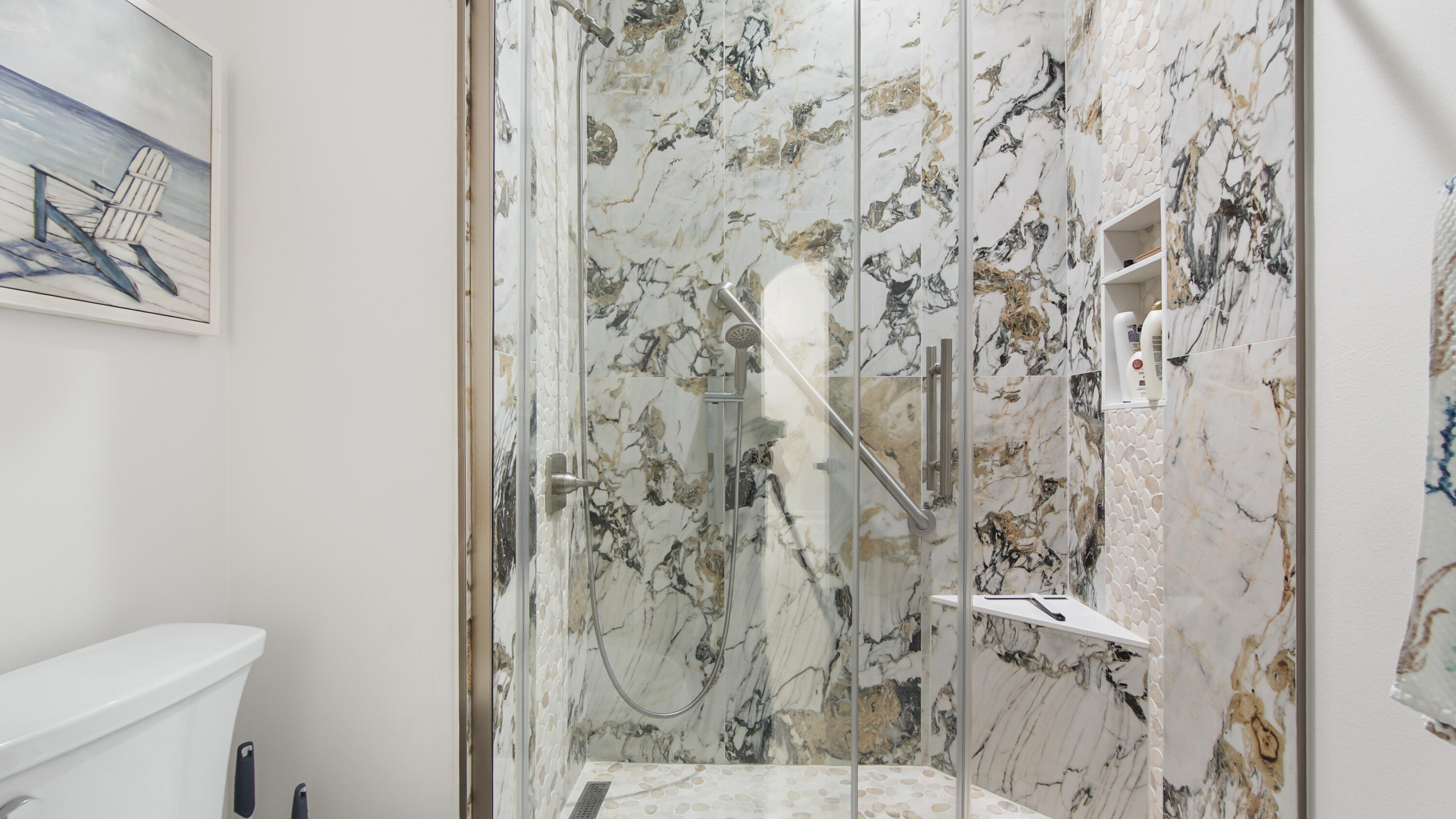 123 Big Oak Lane Santa Rosa Beach, FL 32459 - Photo 26 of 50 a white toilet sitting next to a shower curtain