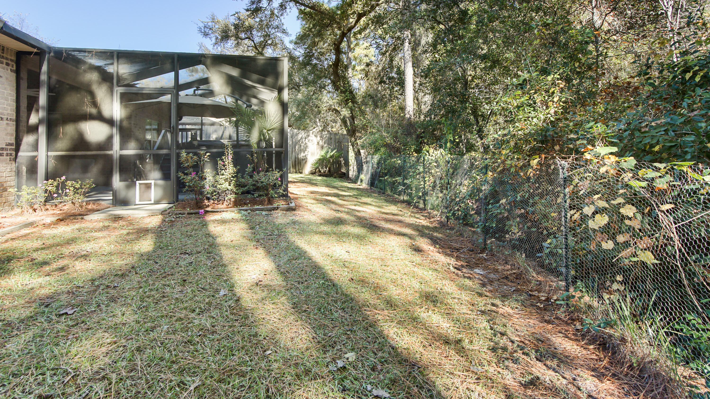 123 Big Oak Lane Santa Rosa Beach, FL 32459 - Photo 43 of 50 a view of entrance gate of a house
