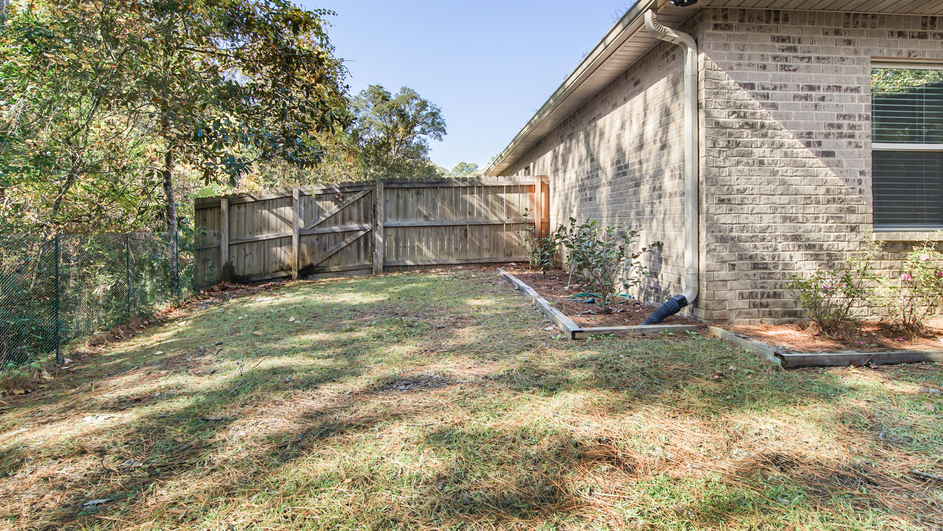 123 Big Oak Lane Santa Rosa Beach, FL 32459 - Photo 44 of 50 a view of a house with a yard