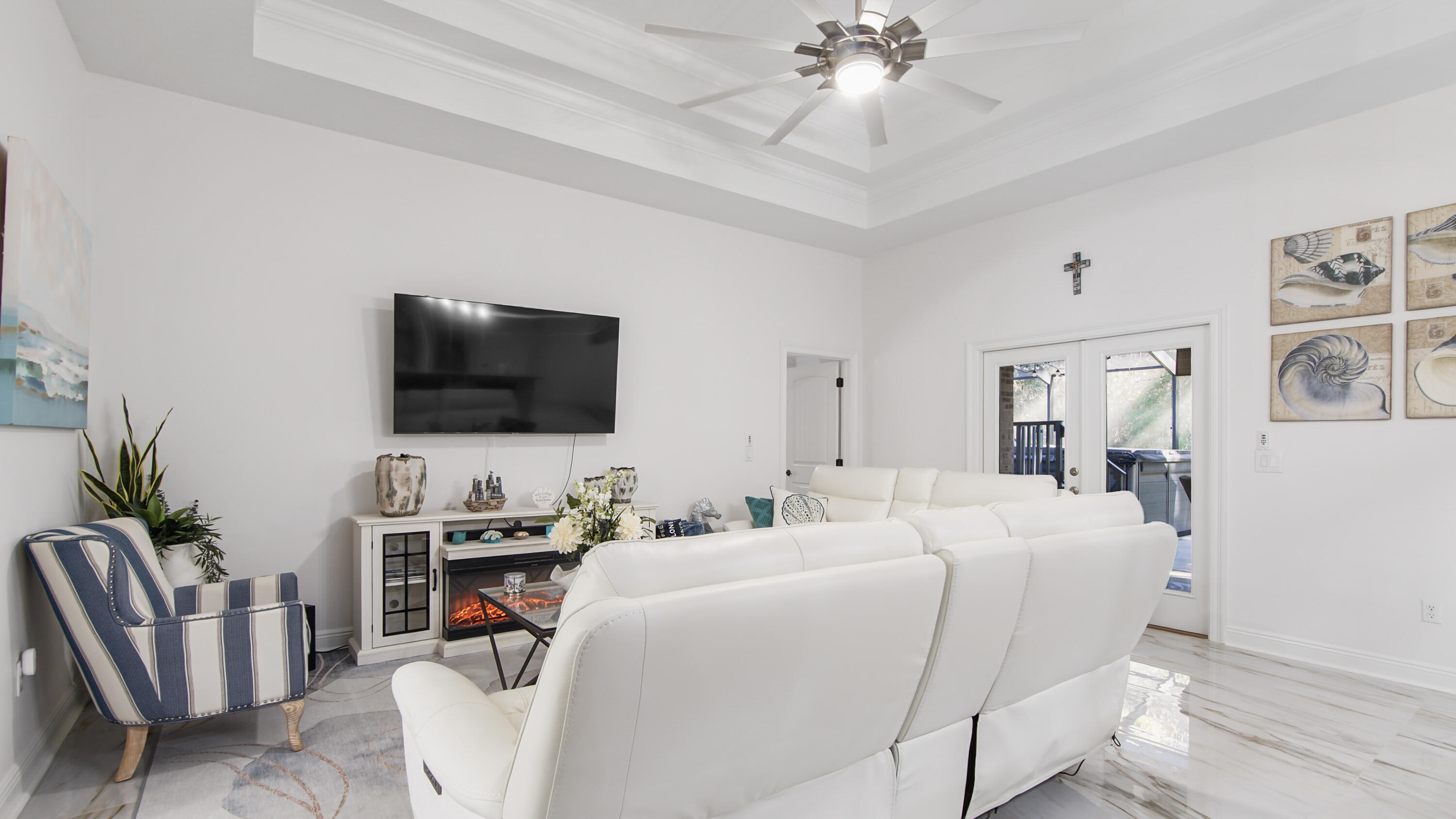 123 Big Oak Lane Santa Rosa Beach, FL 32459 - Photo 10 of 50 a bedroom with furniture and a flat screen tv