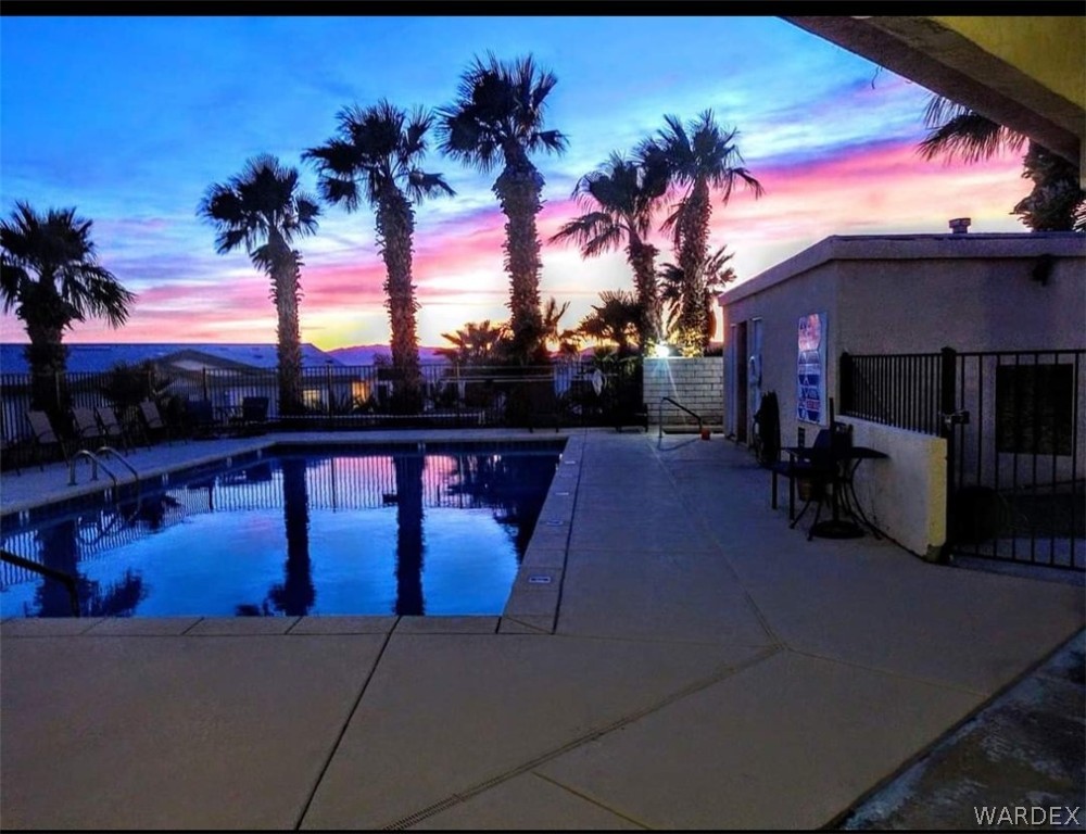 2066 East El Rodeo Road, Unit 31 Fort Mohave, AZ 86426 - Photo 12 of 12 a view of a chairs and tables in the patio