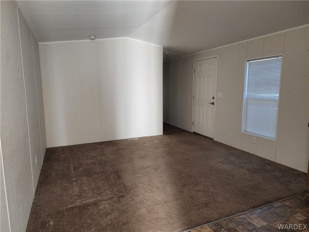 2066 East El Rodeo Road, Unit 31 Fort Mohave, AZ 86426 - Photo 5 of 12 a view of an empty room