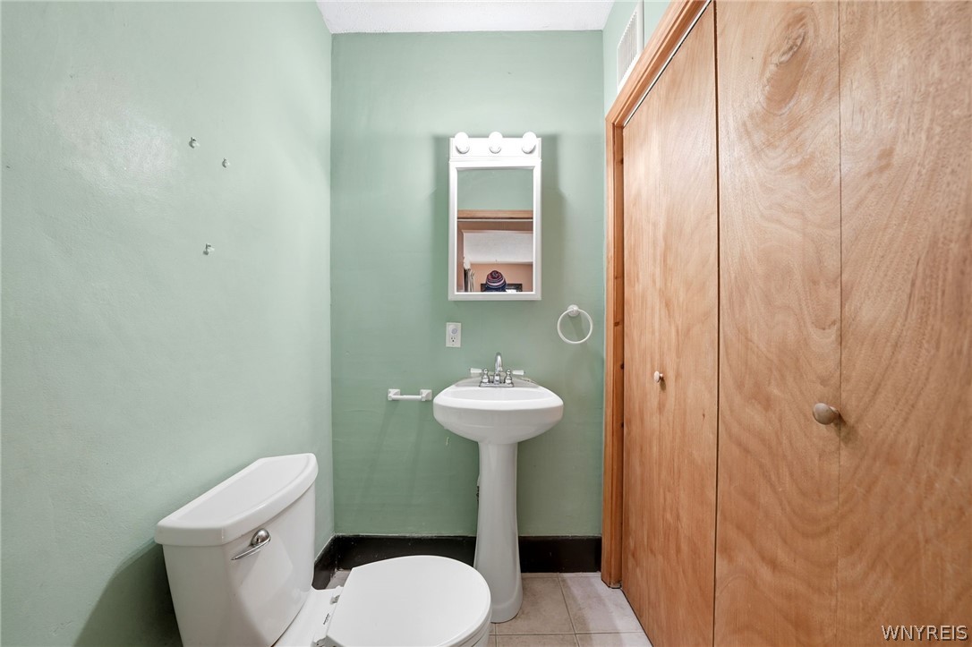 65 Hammerschmidt Avenue Buffalo, NY 14210 - Photo 15 of 30 Half Bathroom & Laundry
