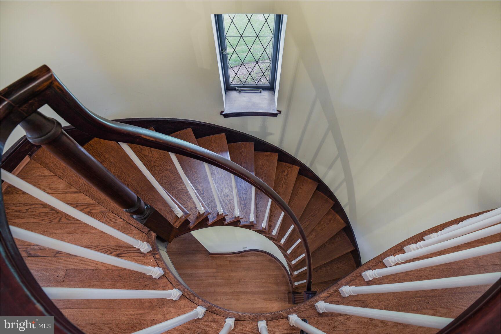 1200 Highland Drive Silver Spring, MD 20910 - Photo 18 of 39 Amazing curved staircase, from 2nd floor hallway