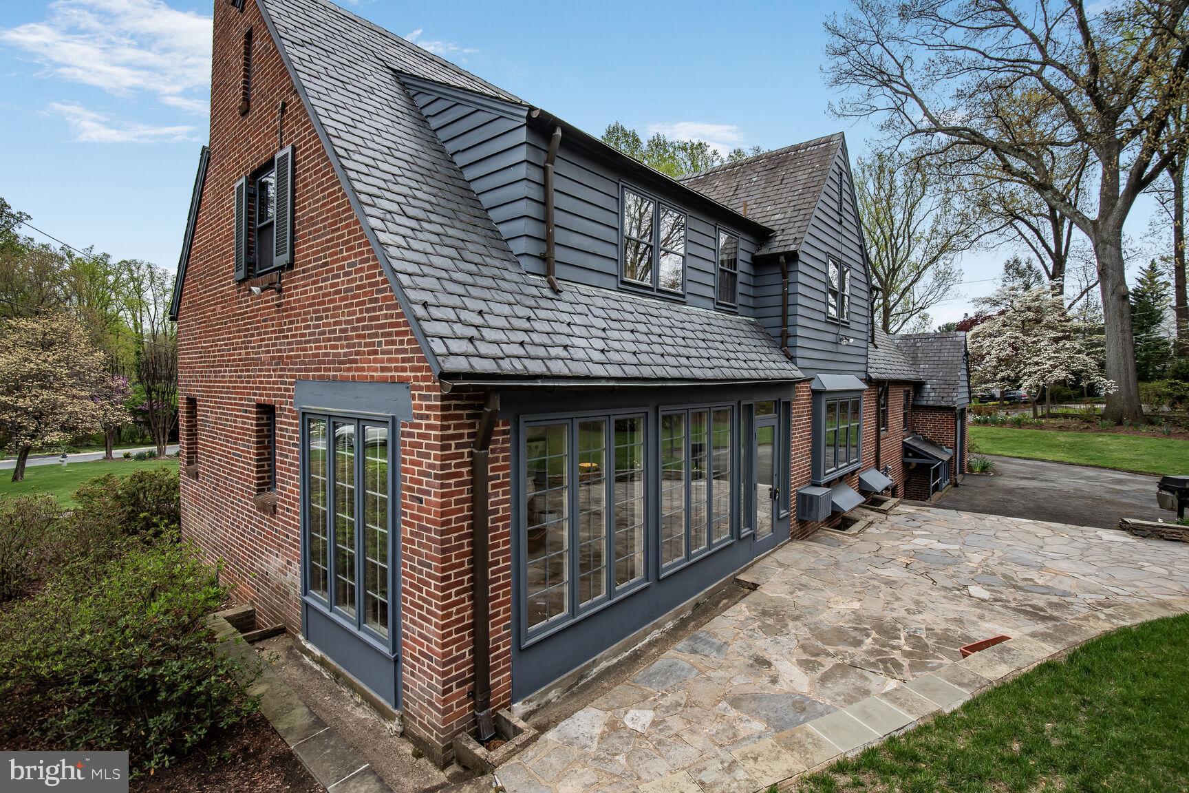 1200 Highland Drive Silver Spring, MD 20910 - Photo 35 of 39 Sun room and patio area
