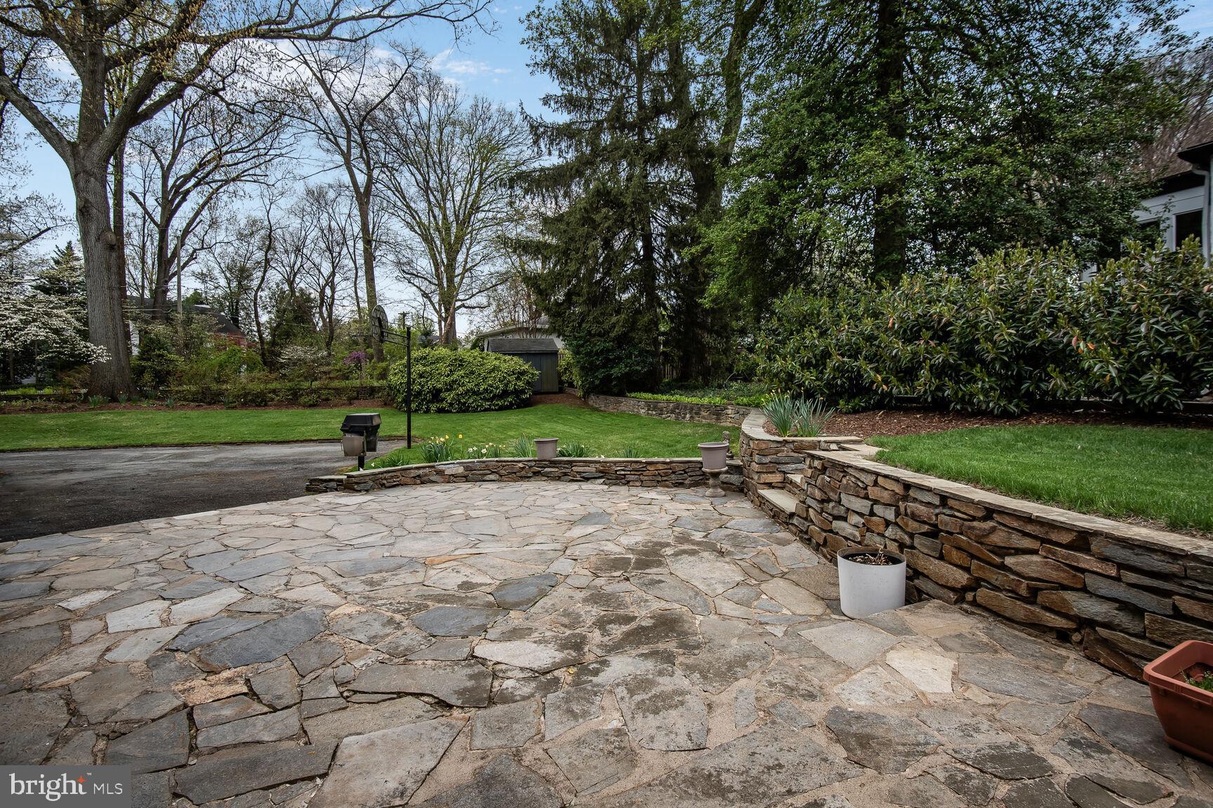 1200 Highland Drive Silver Spring, MD 20910 - Photo 36 of 39 Rear patio and stone wall for wonderful gatherings