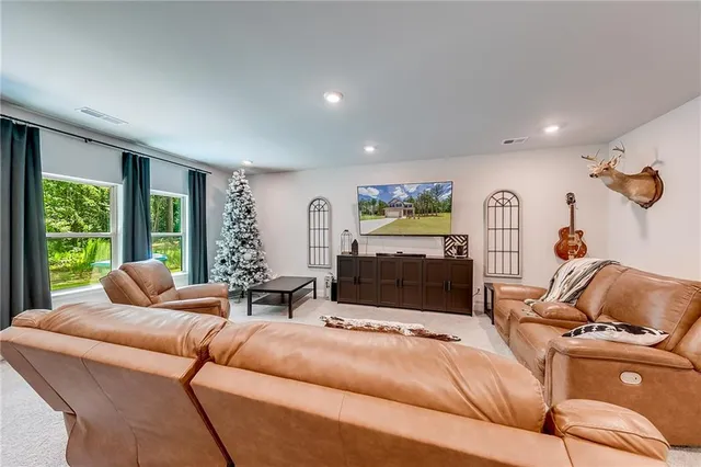 a living room with furniture and a couch