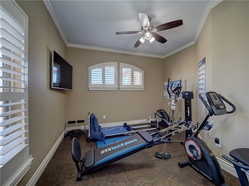 204 Black Diamond Road Portland, TX 78374 - Photo 29 of 40 a view of a room with gym equipment
