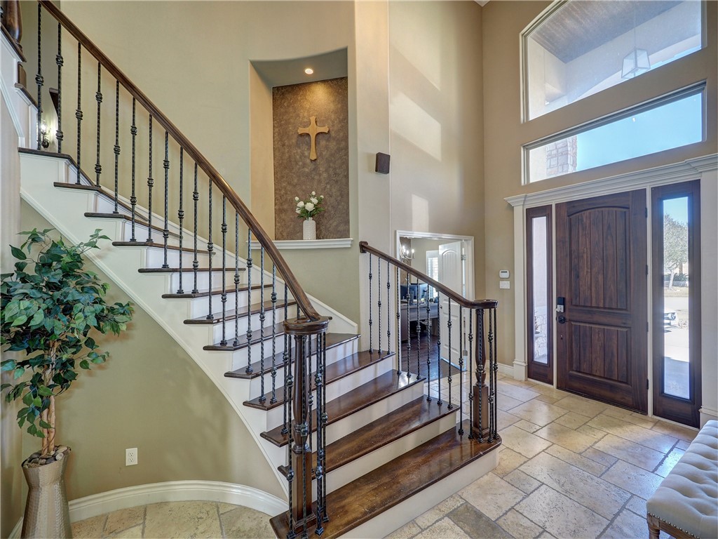 204 Black Diamond Road Portland, TX 78374 - Photo 4 of 40 a view of entryway with wooden floor and stairs