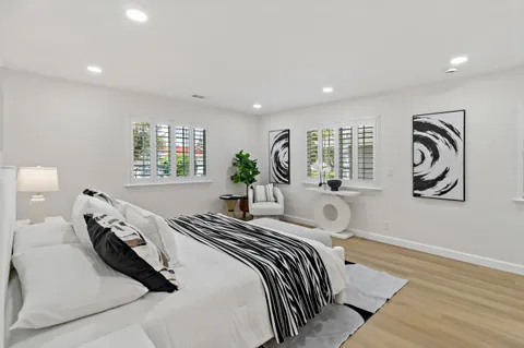 a room with furniture and wooden floor