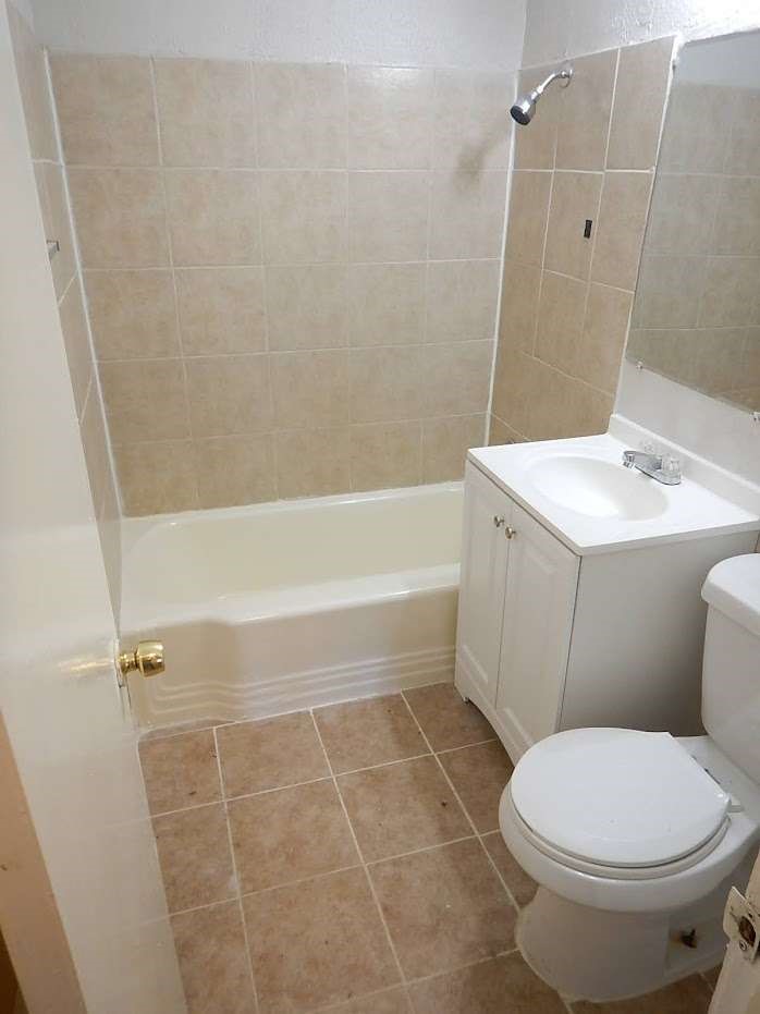 3614 Cosby Street Houston, TX 77021 - Photo 9 of 16 a bathroom with a sink a toilet and shower