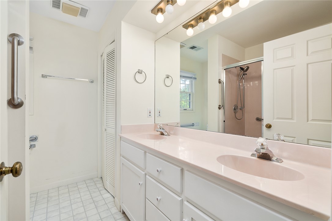 34 Hickory Way Clemson, SC 29631 - Photo 30 of 39 Double vanity with light pink countertops anchors this full bathroom.