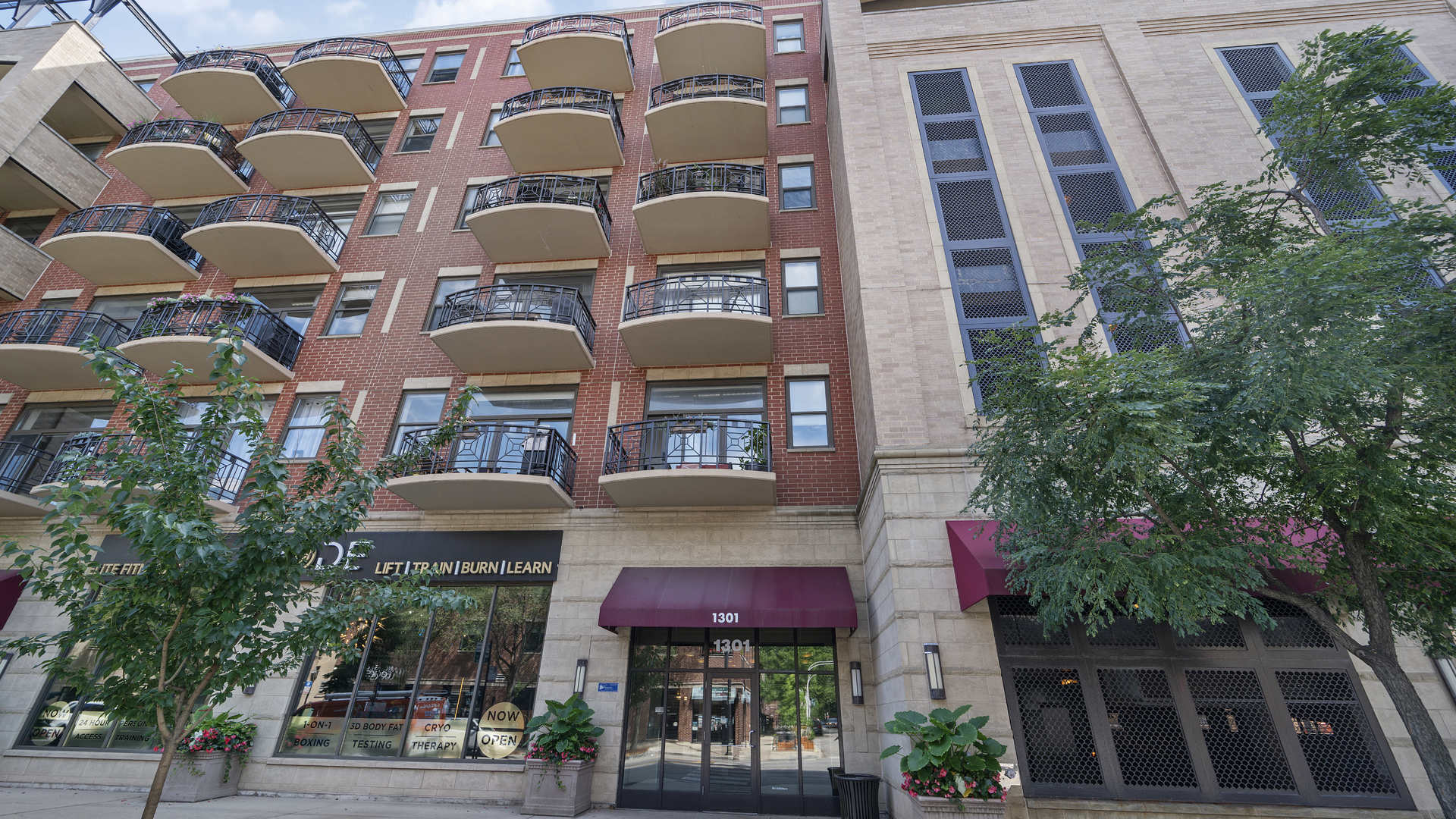 1301 West Madison Street, Unit 304 Chicago, IL 60607 - Photo 1 of 15 front view of a building