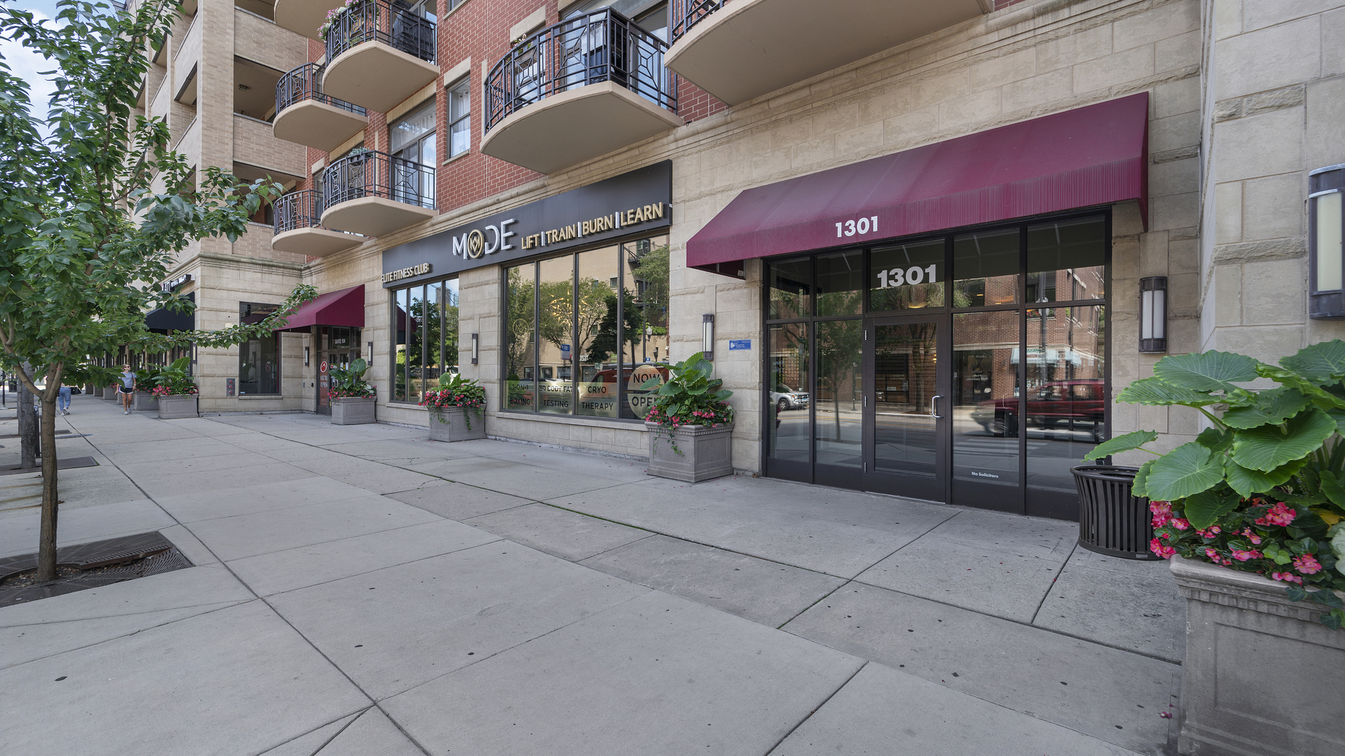 1301 West Madison Street, Unit 304 Chicago, IL 60607 - Photo 2 of 15 a view of a building with a potted plant
