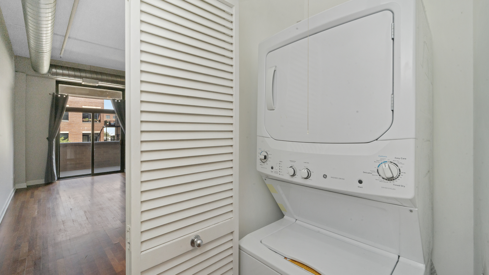 1301 West Madison Street, Unit 304 Chicago, IL 60607 - Photo 13 of 15 a bathroom with a toilet and a shower