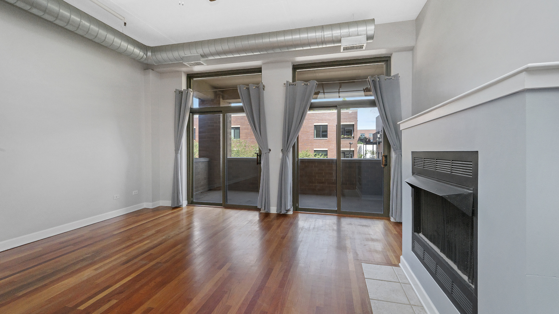 1301 West Madison Street, Unit 304 Chicago, IL 60607 - Photo 5 of 15 a view of gallery with wooden floor