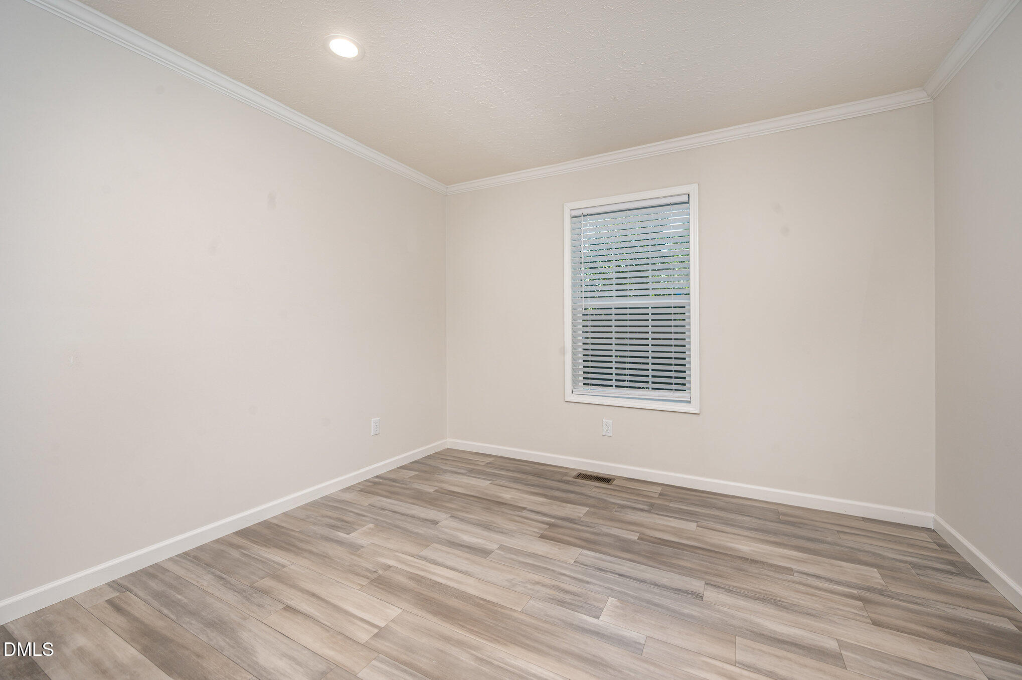 2551 Old Durham Road Roxboro, NC 27573 - Photo 18 of 28 wooden floor in an empty room with a window