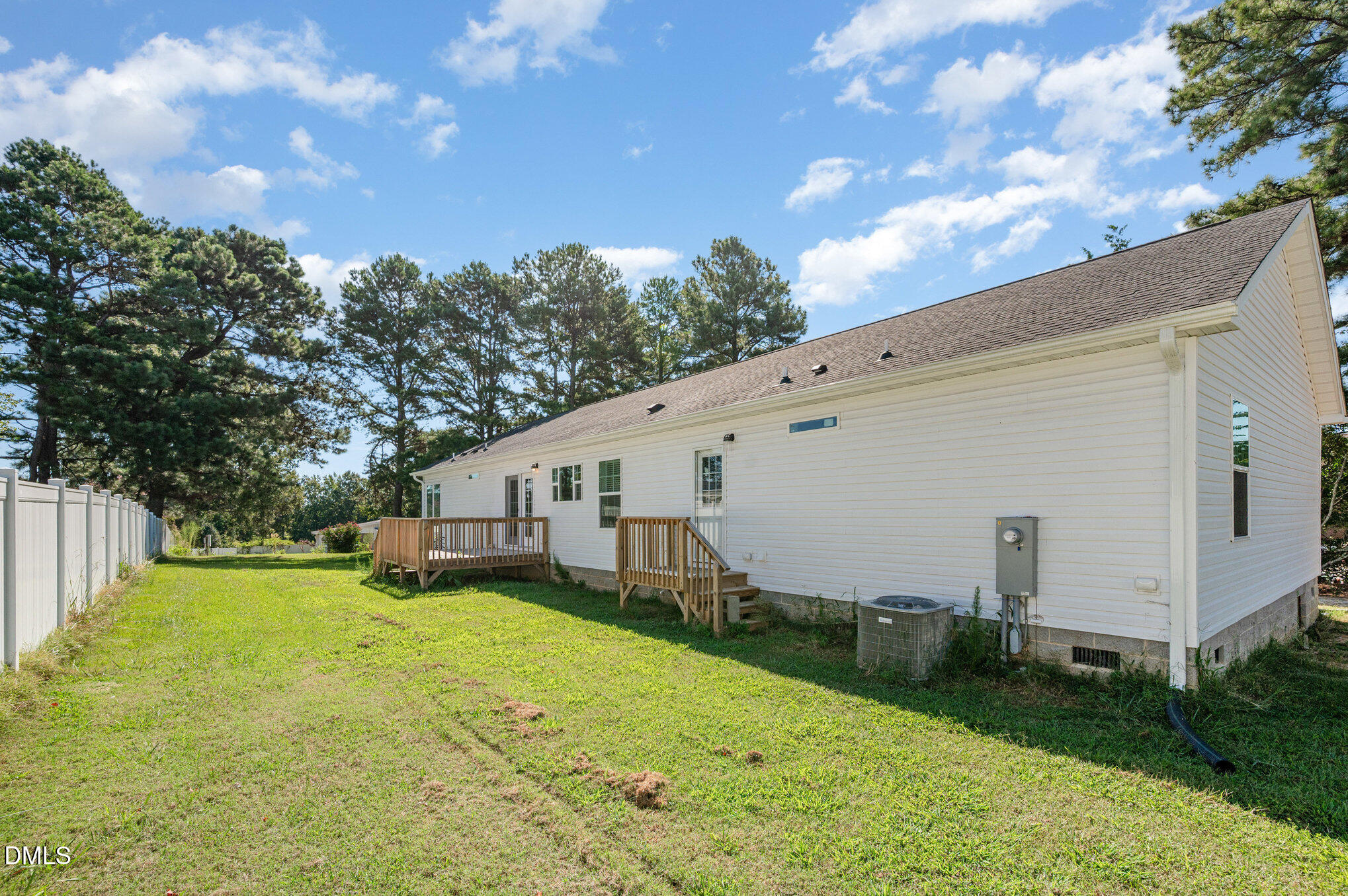 2551 Old Durham Road Roxboro, NC 27573 - Photo 26 of 28 a view of a house with a yard