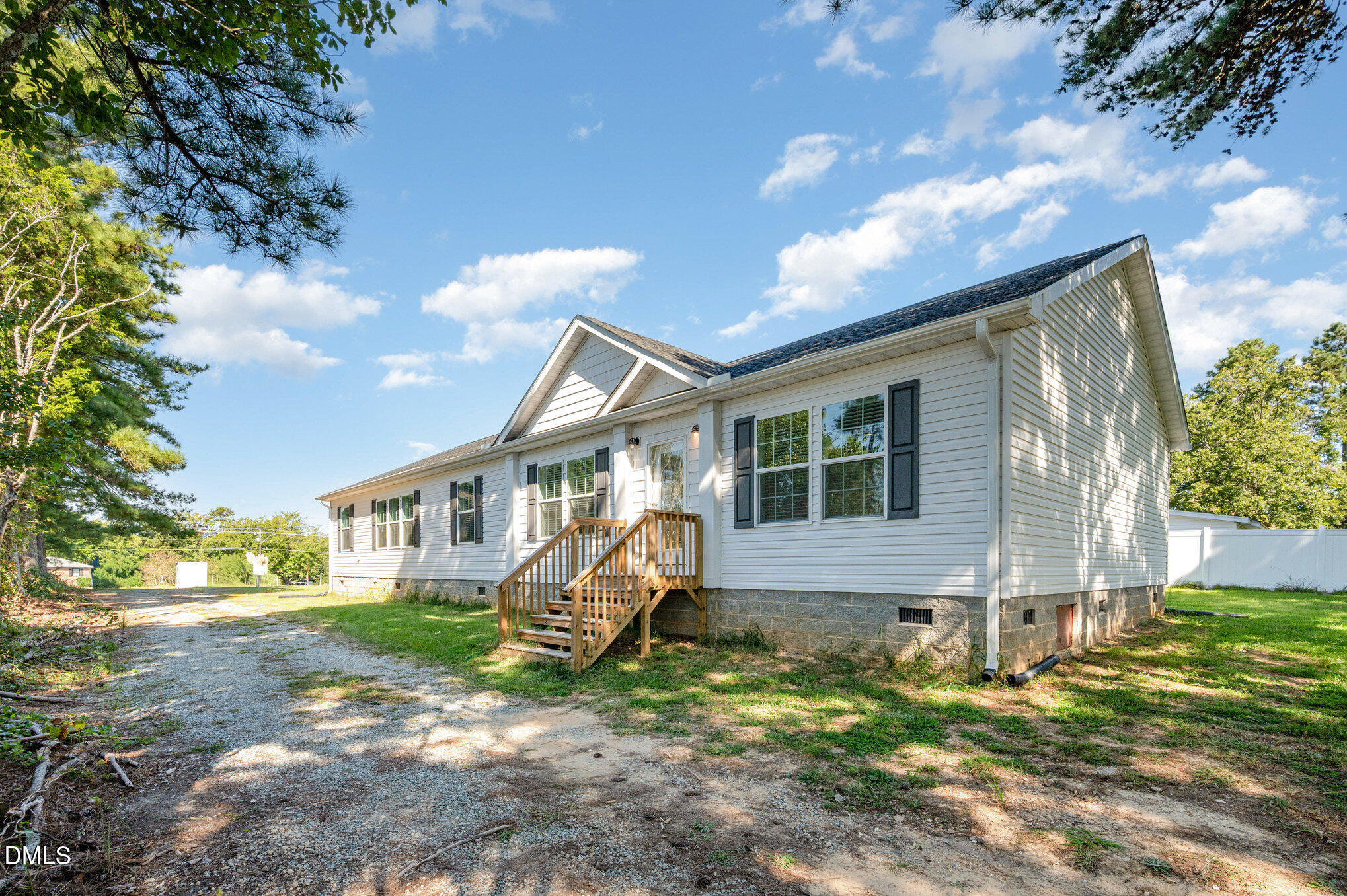 2551 Old Durham Road Roxboro, NC 27573 - Photo 4 of 28 a view of house with a yard