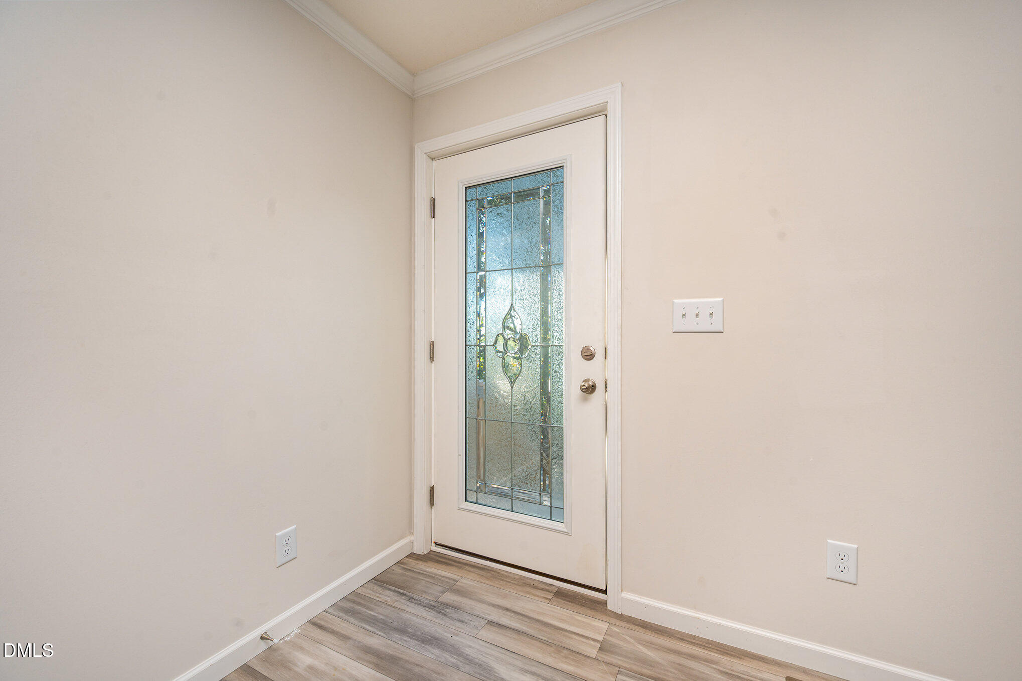 2551 Old Durham Road Roxboro, NC 27573 - Photo 6 of 28 a view of a small space with wooden floor