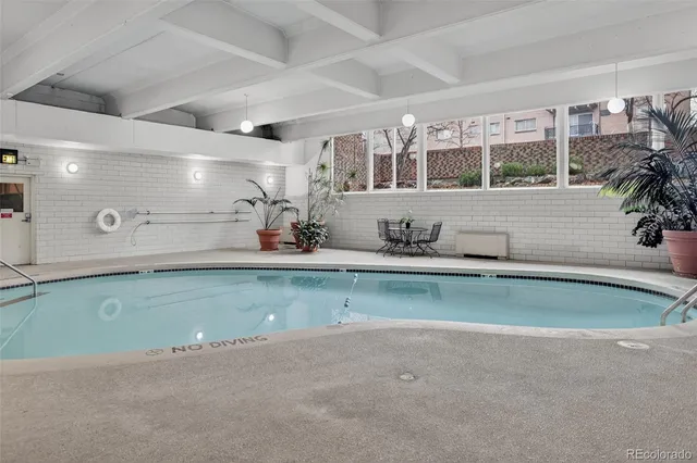 a bathroom with a sink and a large mirror