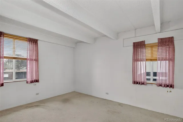 an empty room with a window