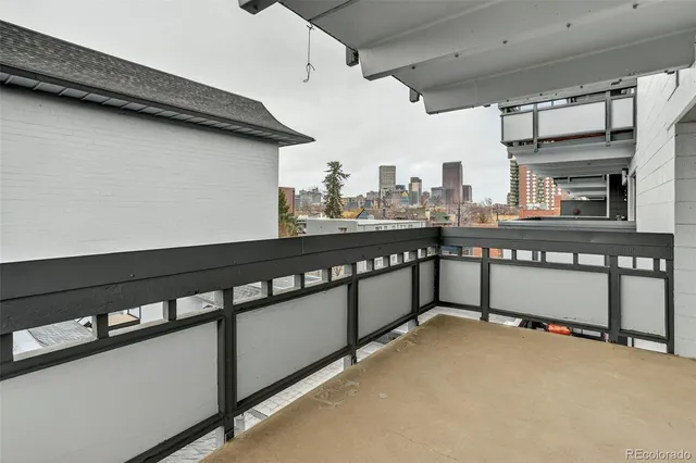 a view of a kitchen with a sink and a window