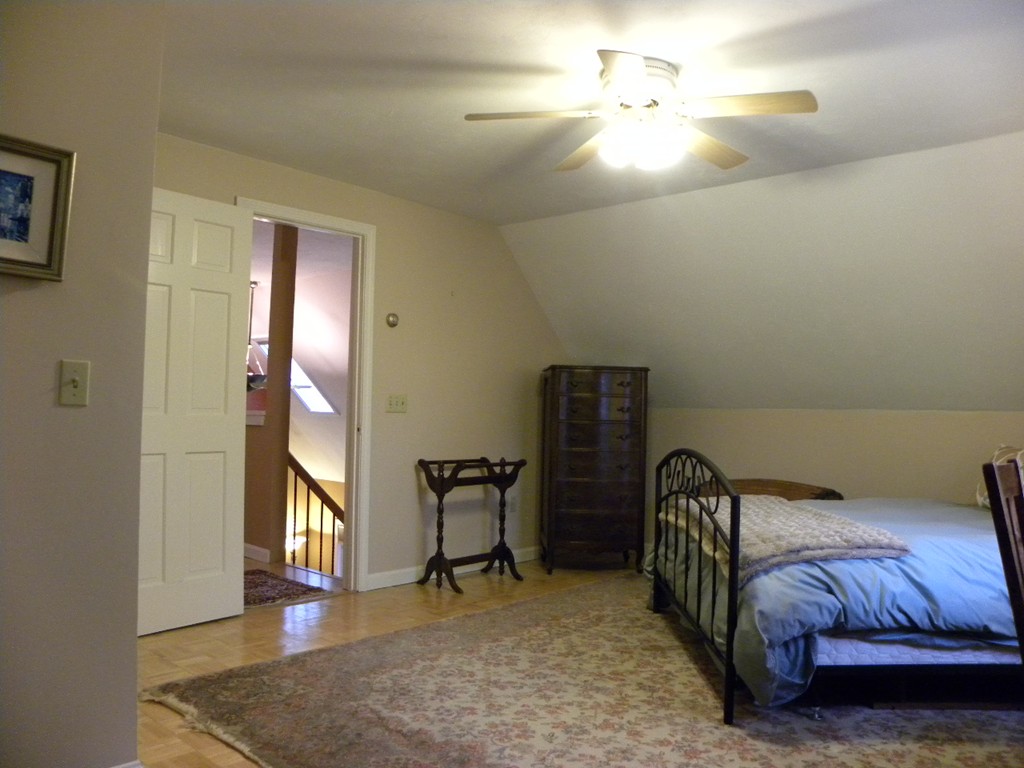 46 Colburn Road Charlton, MA 01507 - Photo 10 of 22 a bedroom with furniture and a rug